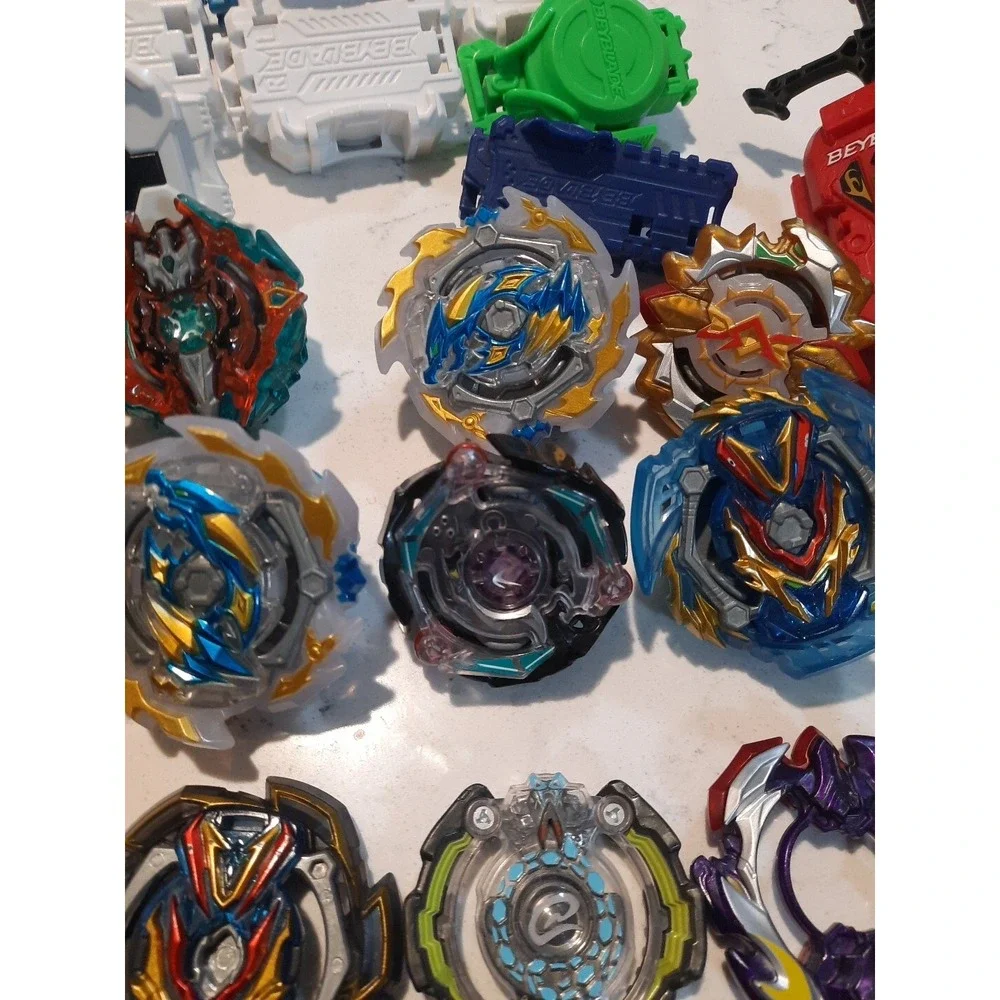 Lot Of 8 Beyblade And Different Parts